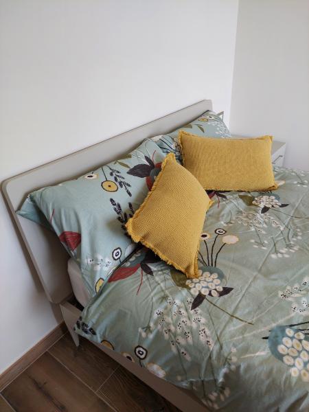 Bedroom with wood details at Crandola